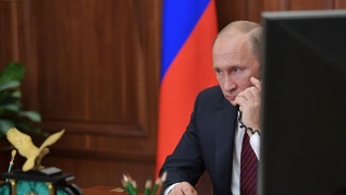 Владимир Путин обсудил с Макроном и Меркель кризис на Украине